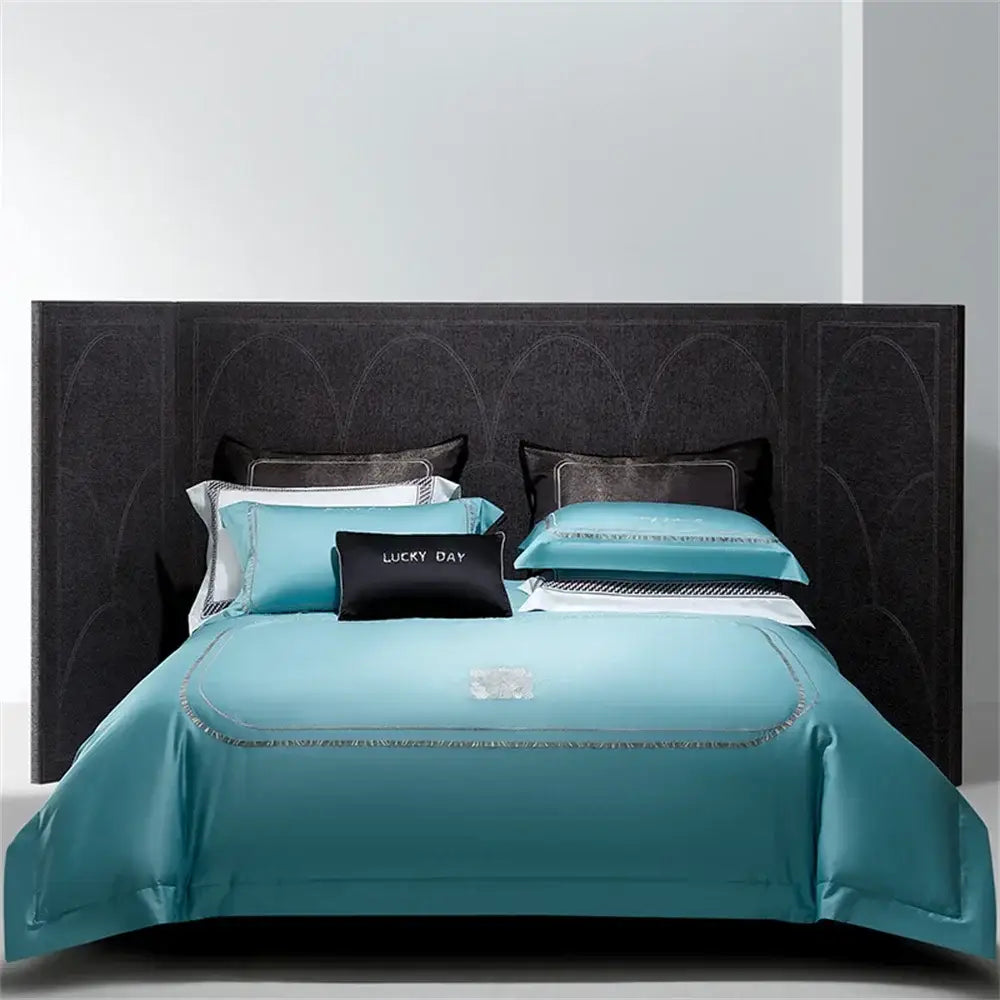 Teal satin bedding set with silver cotton satin jacquard embroidery and lucky day black accent pillow for decorbites