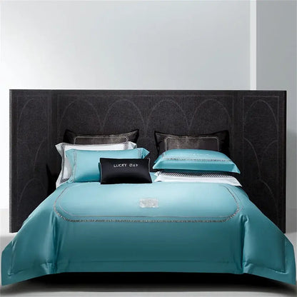 Teal satin bedding set with silver cotton satin jacquard embroidery and lucky day black accent pillow for decorbites