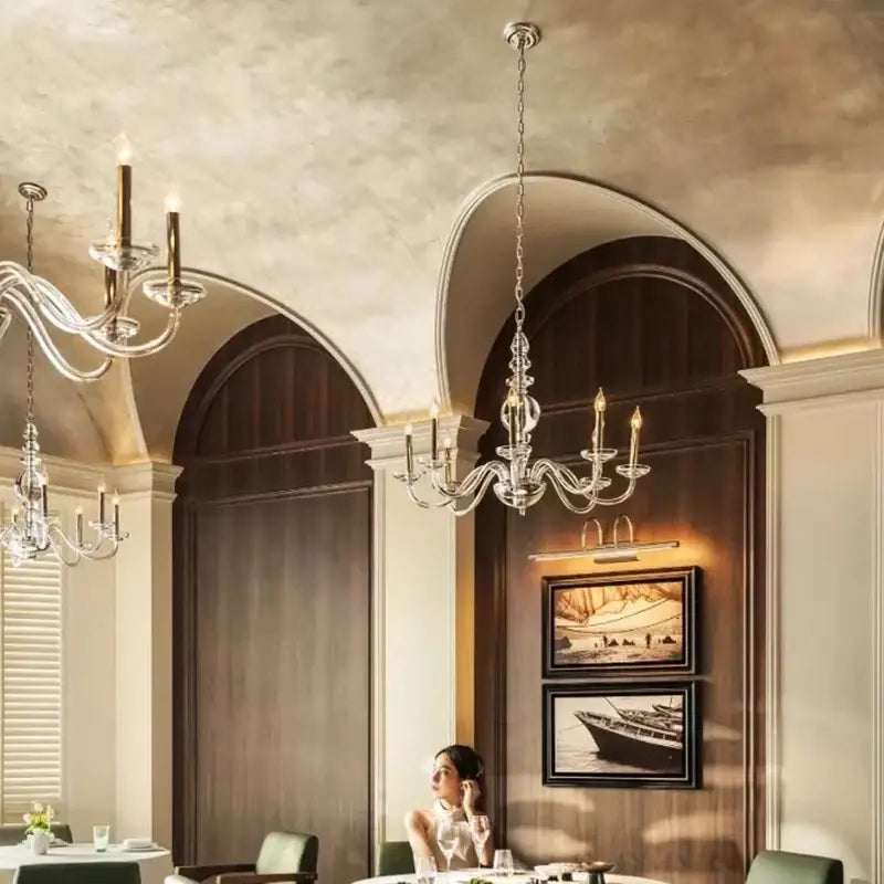 Silver decorbites crystal branch chandelier with multiple arms and candle style bulbs for dining room lighting