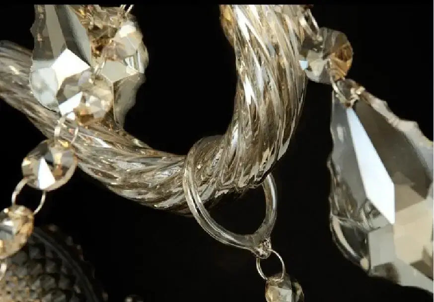 Silver crystal cognac wall lamp with twisted glass arm, faceted crystal droplets, and gold-toned decorbites crystal cognac accents