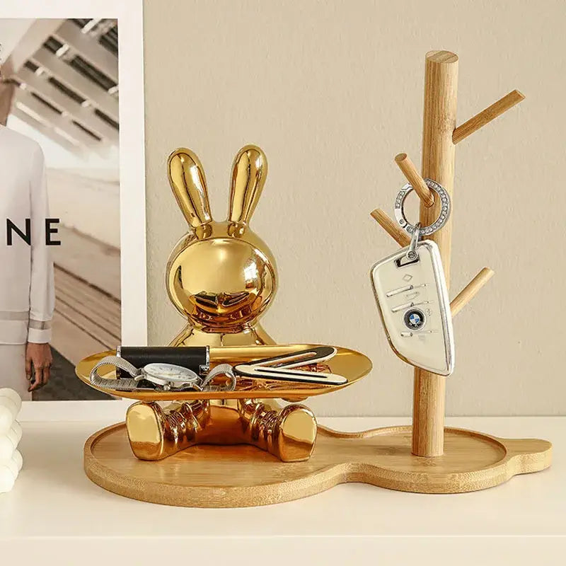 Golden decorbites astronaut rabbit resin tray with glossy metallic finish and circular base for organizing keys and watches
