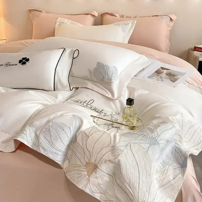 Elegant white satin bedding set with silver floral embroidery and gold thread accents in decorbites cotton king size