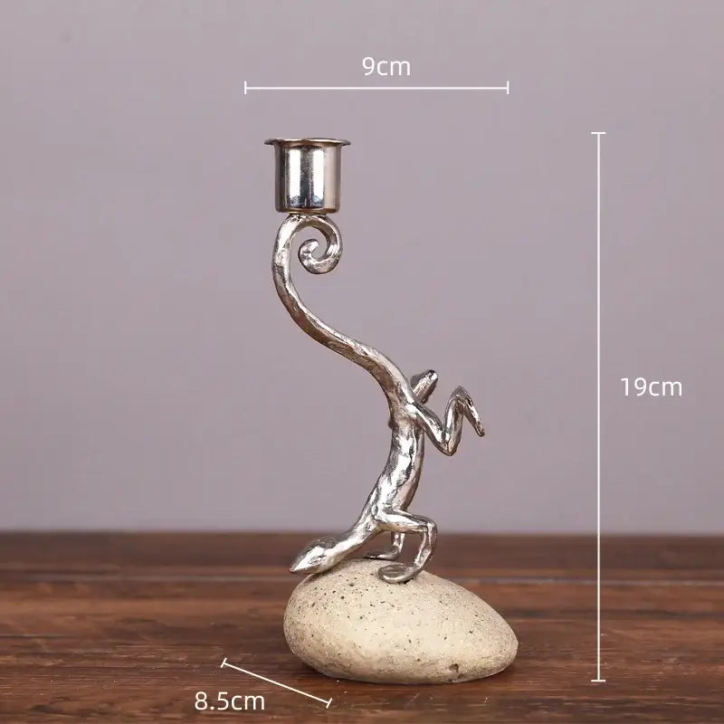 Silver gecko lizard resin candlestick with a curved metallic body and polished cup for living room decorbites decor
