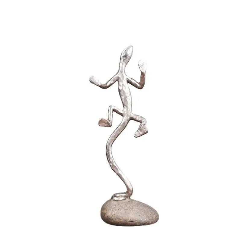 Silver gecko lizard resin figurine with stylized limbs on stone base for living room decorbites gecko lizard decor