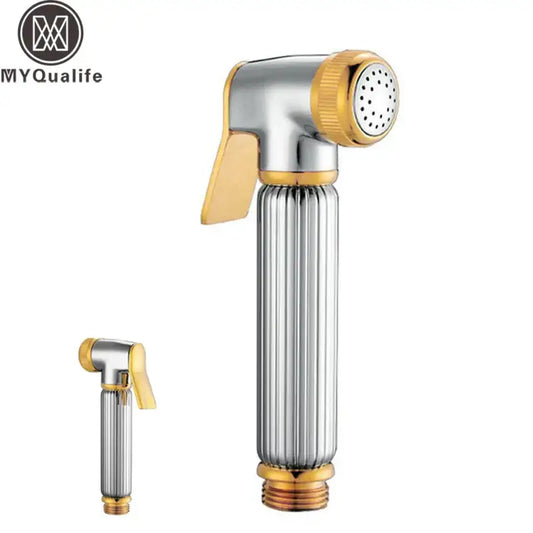 A sleek silver and golden bidet sprayer with brushed silver body and gold accents for bathroom handheld use