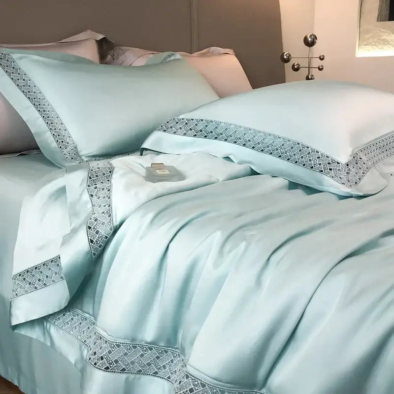 Light blue satin silver gray eucalyptus fiber summer quilt with delicate silver geometric embroidery decorbites eucalyptus fiber