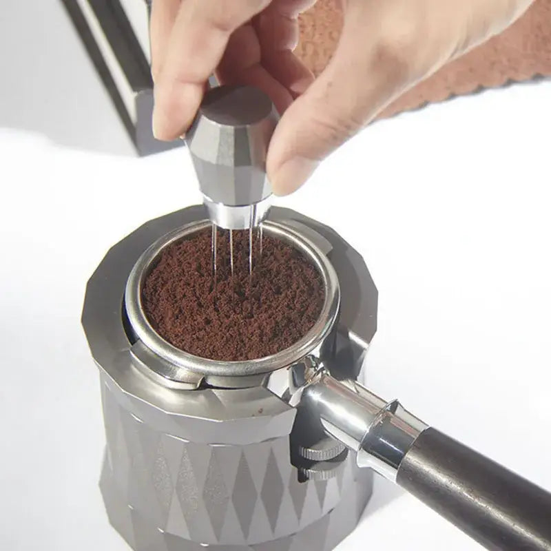 Silver hexagonal aluminum espresso distributor wdt tool with geometric pattern and textured handle metallic tamping tool