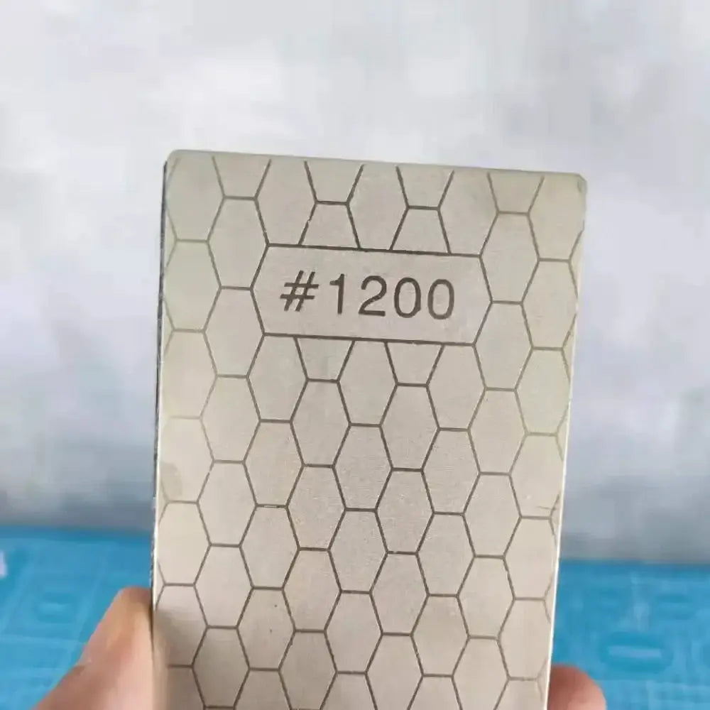 Beige metallic diamond knife sharpener sheet with hexagonal pattern and #1200 marking for kitchen whetstone bars