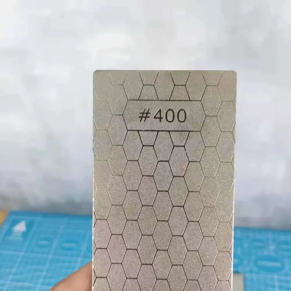 Silver hexagonal diamond knife sharpener bar with #400 grit marking for precise kitchen knife sharpening