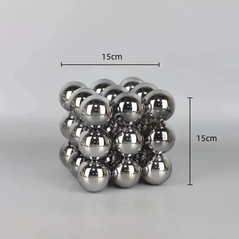 A 15cm cube-shaped silver magnetic ball sculpture made of polished crystal glass ball stack blocks for living room decor