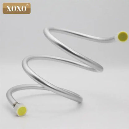 Silver pvc flexible shower hose with yellow caps and metallic spiral connector branded xoxo for bathroom use