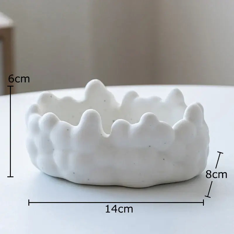 White ceramic planter with a crown-like textured rim and speckled surface for decorbites ceramic bubble clouds decor