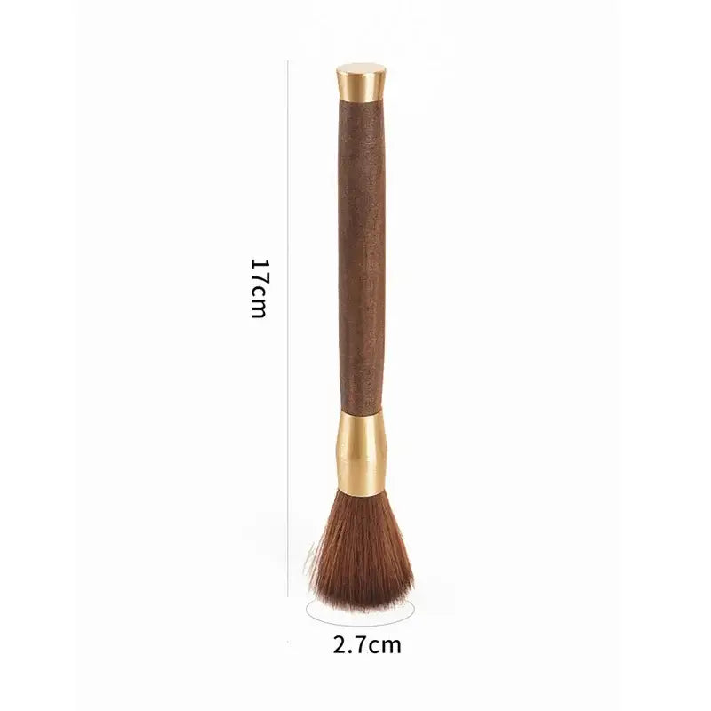 Silver textured espresso brush with dark brown wooden handle and soft bristles for coffee grinder cleaning and kitchen use