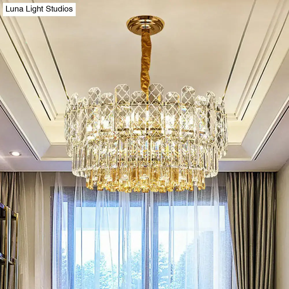 A luxurious gold-toned decorbites rectangular drum crystal chandelier with 9 bulbs featuring simple style light type