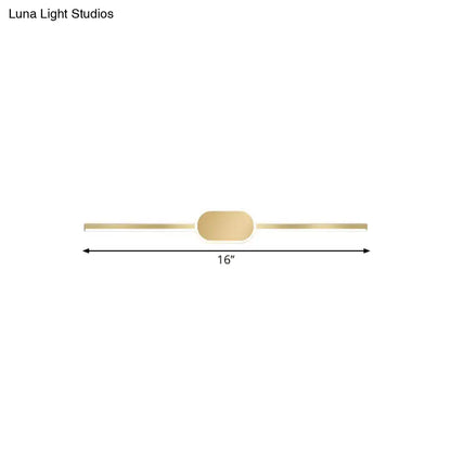 Gold-toned simple style wall mounted vanity sconce with minimalist linear LED design and central oval accent