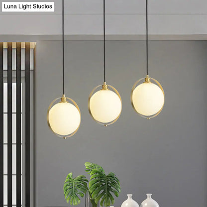 Simple White Frosted Glass Pendant Light with Brass Ring - Global Suspended Lamp for Bedside or Ceiling, 1 Bulb