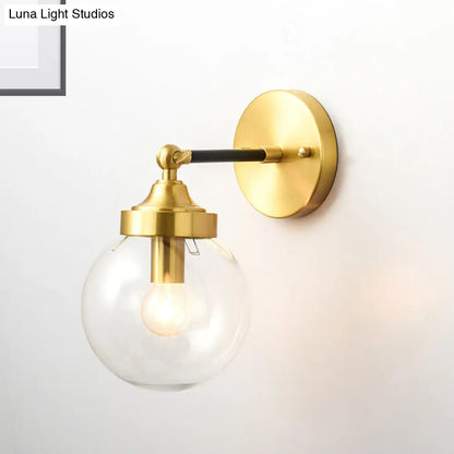 DecorBites™ DecorBites™ Simplicity Adjustable Globe Sconce Light Brass Wall Mount Lamp - 1 Bulb with Transparent Glass Shade