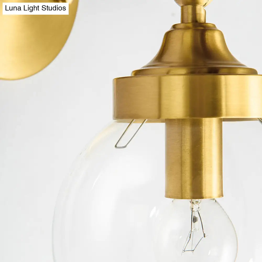 DecorBites™ DecorBites™ Simplicity Adjustable Globe Sconce Light Brass Wall Mount Lamp - 1 Bulb with Transparent Glass Shade
