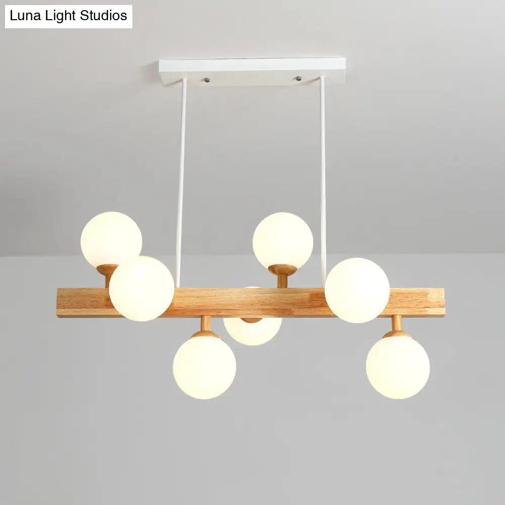 Lámpara colgante DecorBites™ Simplicity con globo de cristal opalino - Araña de madera de 7 luces para comedor