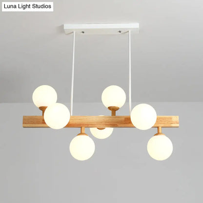 Lámpara colgante DecorBites™ Simplicity con globo de cristal opalino - Araña de madera de 7 luces para comedor
