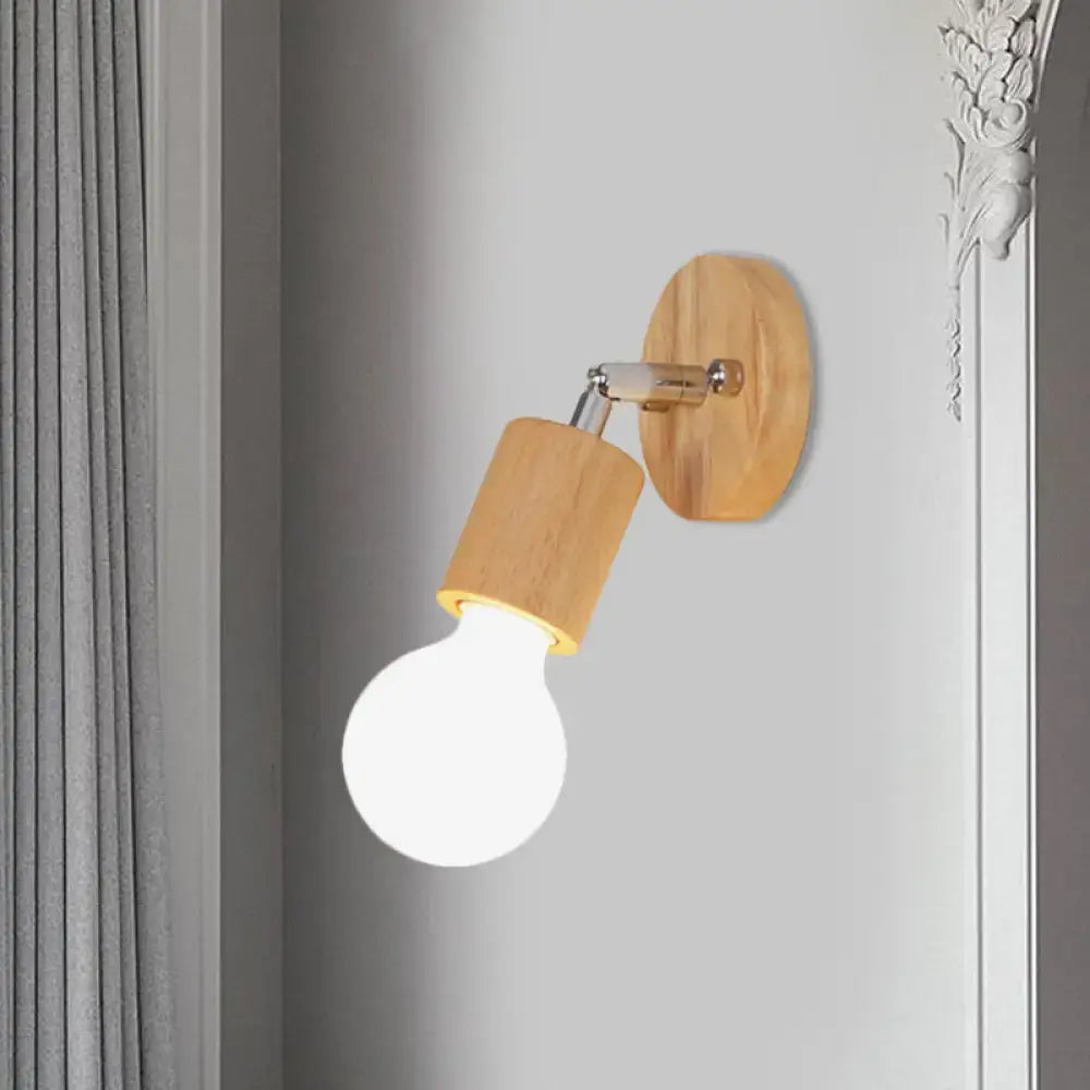 A warm-toned wooden wall sconce with a sleek chrome arm and classic bulb mini rotating for bedroom use