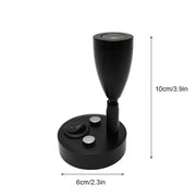 Sleek black adjustable led reading lamp with circular base and silver buttons for rv and bedroom interior use