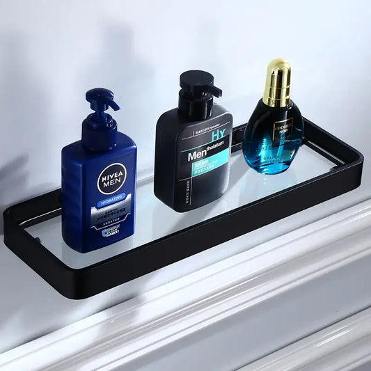 Black aluminum glass shelf with sleek metal frame holding three grooming products for bathroom storage decorbites black aluminum