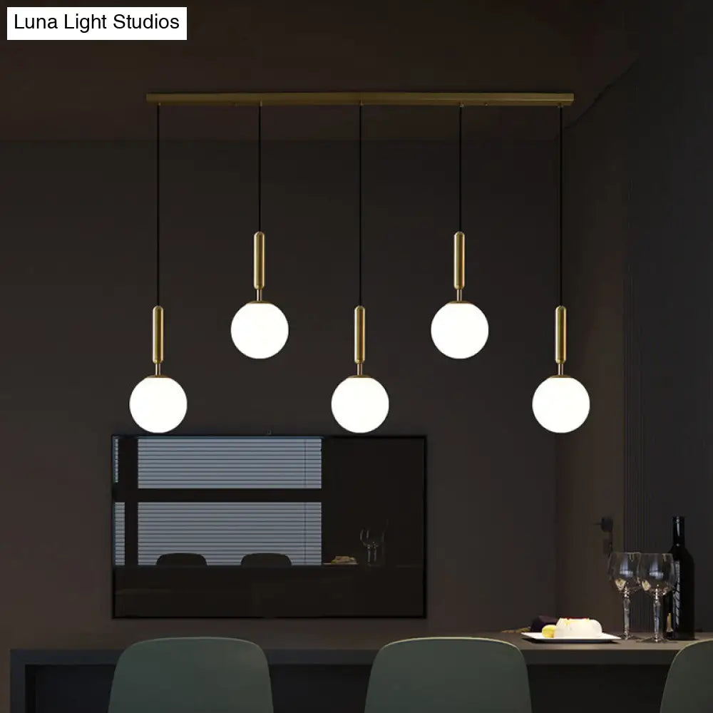 Sleek Brass Ball Pendant Light for Open Kitchen - Simplicity Glass Ceiling Fixture