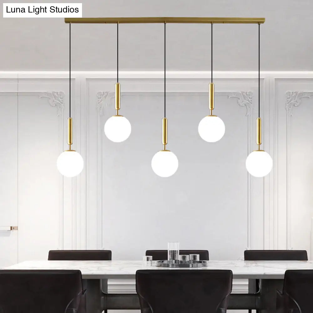 Sleek Brass Ball Pendant Light for Open Kitchen - Simplicity Glass Ceiling Fixture