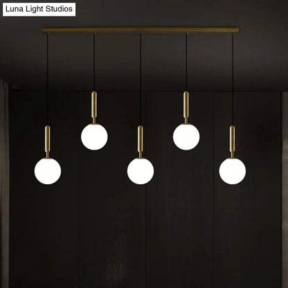 Sleek Brass Ball Pendant Light for Open Kitchen - Simplicity Glass Ceiling Fixture