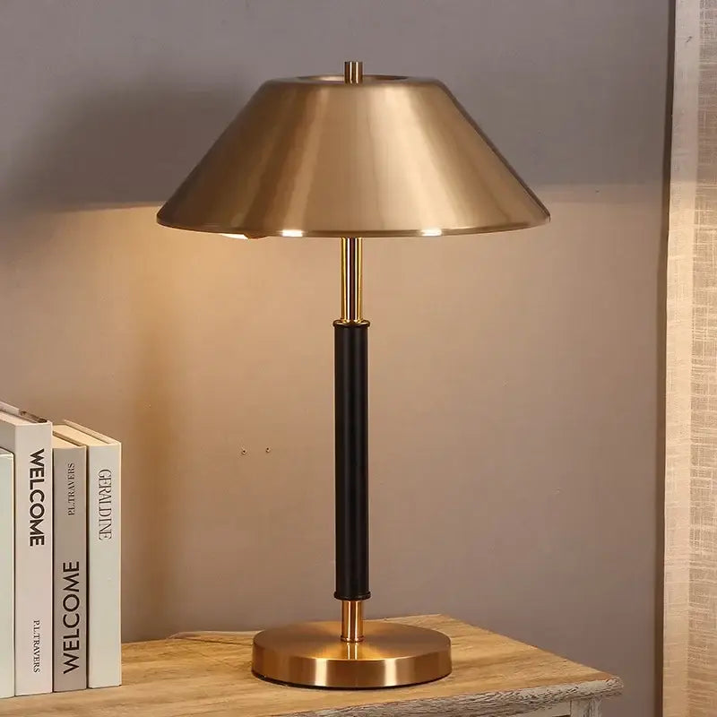 Sleek brass and black copper table lamp with conical shade cylindrical stem and circular base for bedroom decorbites copper table lamp