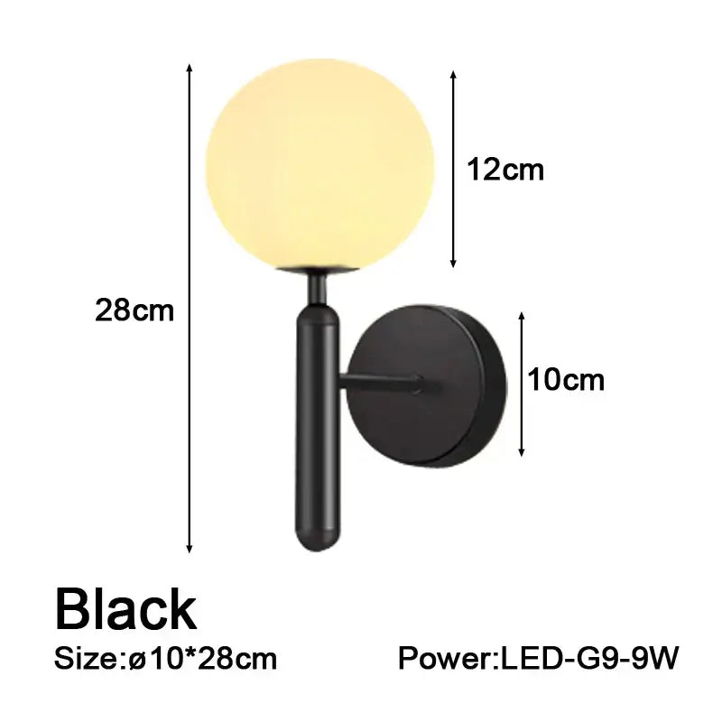 Black modern wall sconce lamp with spherical frosted glass globe and matte black metal arm for corridor lighting
