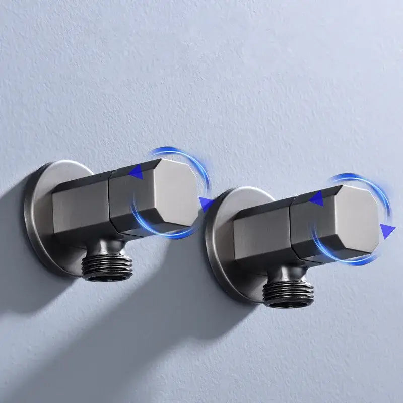 Pair of brushed stainless steel angular corner valves with hexagonal handles for water control in bathroom tap