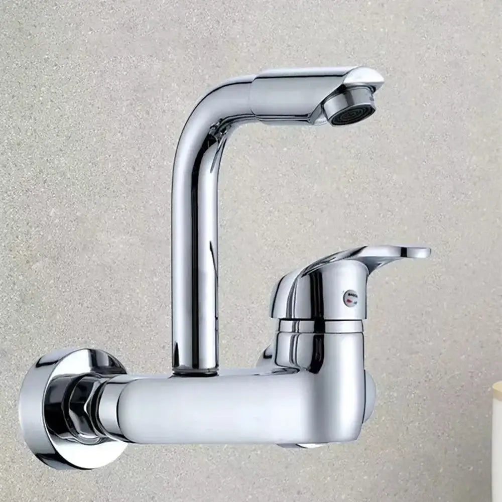 Sleek chrome curved spout single lever kitchen faucet with wall-mounted design and integrated pull-down spray head