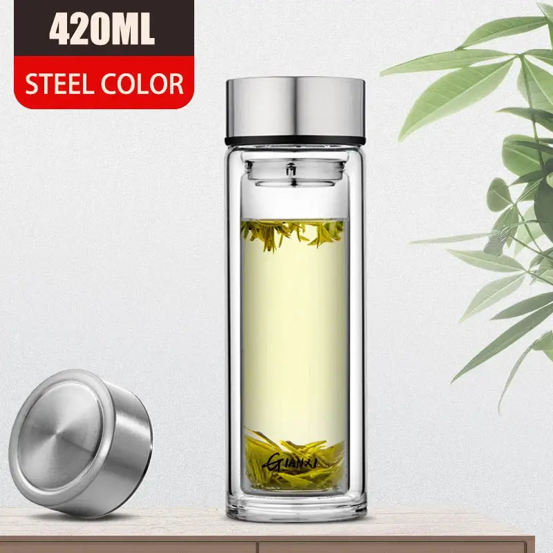 Sleek double-walled glass water bottle with filter 420ml steel-colored lid and base for modern kitchen use