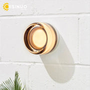 Sleek gold round wall sconce glass soap dish with glossy finish and subtle concentric ridges for bathroom use