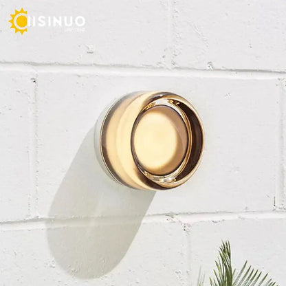 Gold-finished round wall sconce soap dish with sleek modern design and glass round wall feature for bathroom use