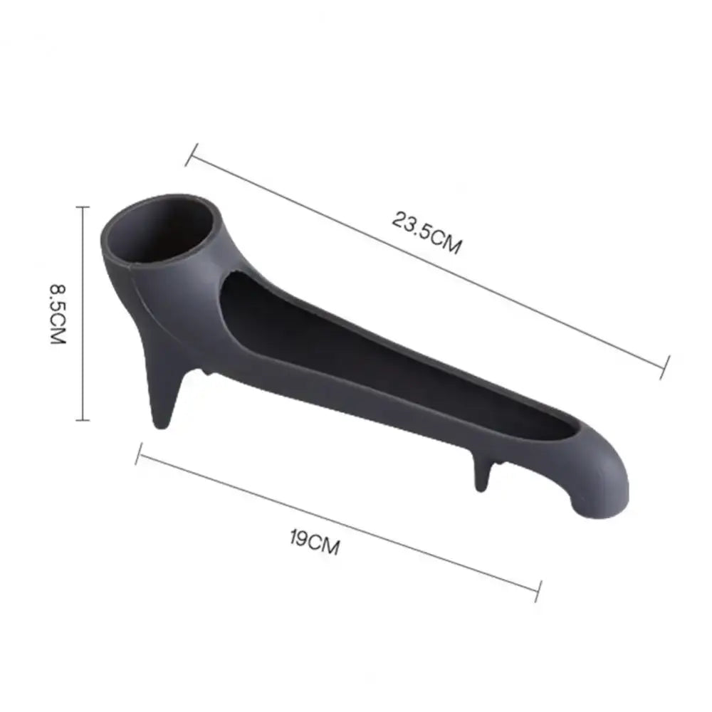 Black plastic bottle opener with ergonomic design and feet, paired with sleek gray silicone water tank deflector for kitchen use