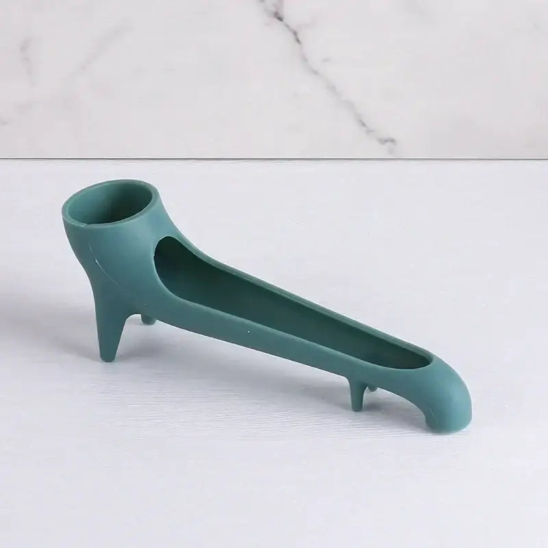 Teal silicone can opener with ergonomic design and three feet shown alongside sleek gray silicone water tank deflector