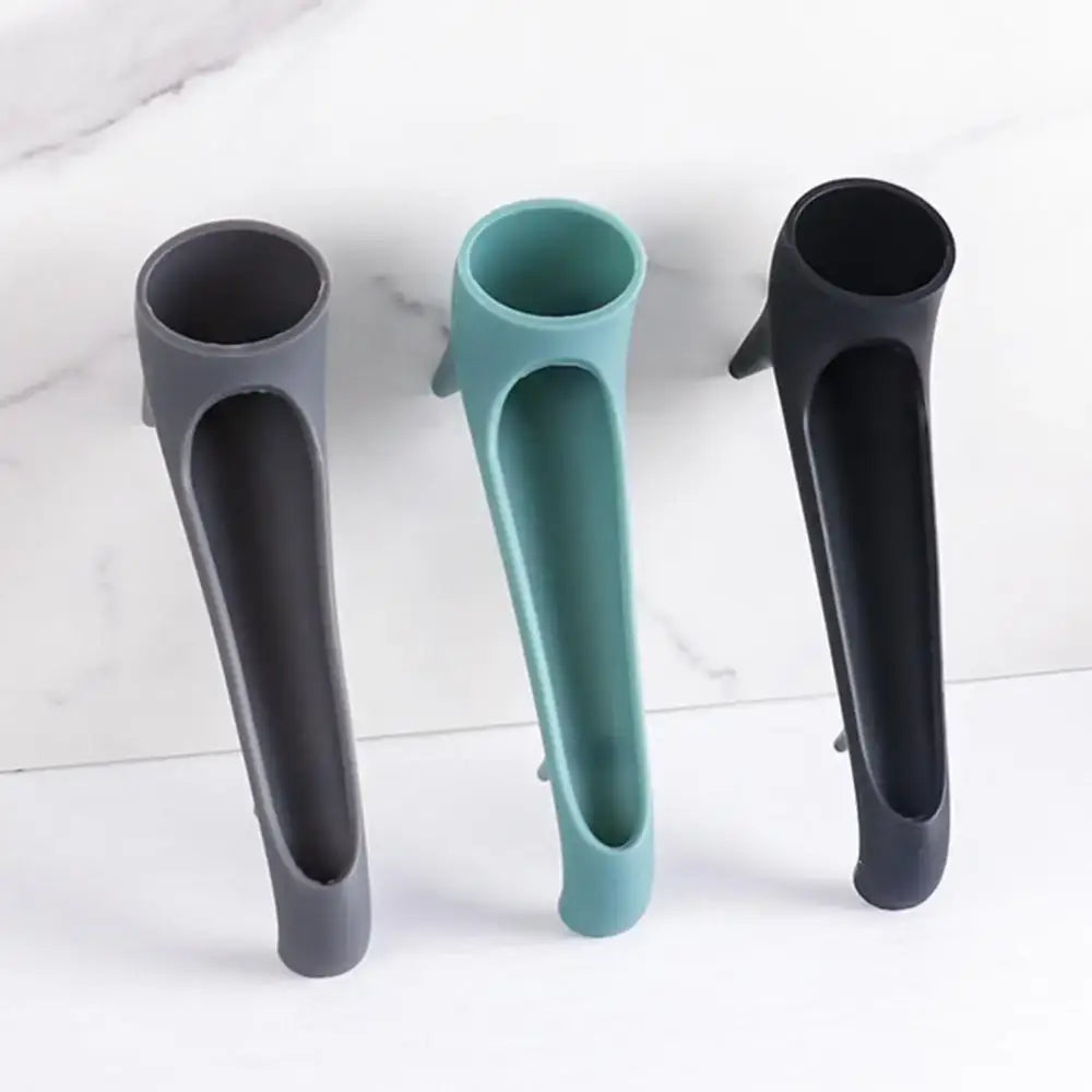 Three sleek gray teal and black silicone bottle openers designed as water tank deflectors for kitchen use