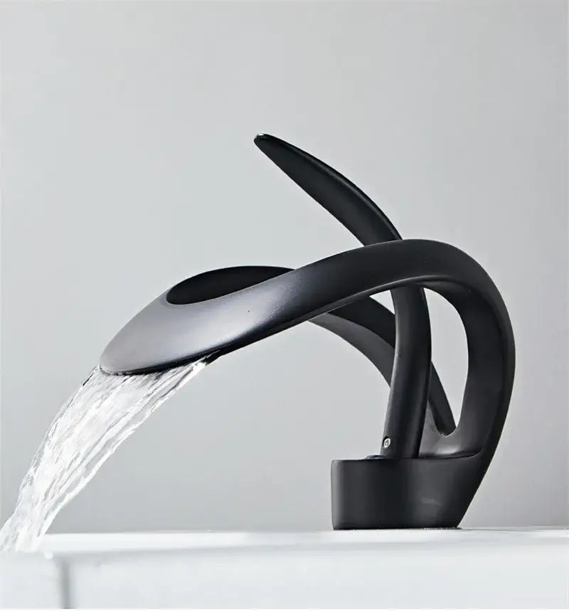 Sleek matte black brass basin faucet with modern waterfall design for bathroom decorbites black brass collection