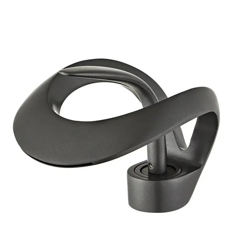 Sleek matte black brass waterfall basin faucet with black matte-finished metal sculpture and abstract curves decorbites black brass
