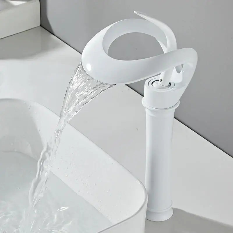 White ceramic basin faucet with sleek modern waterfall design by decorbites black brass for bathroom use