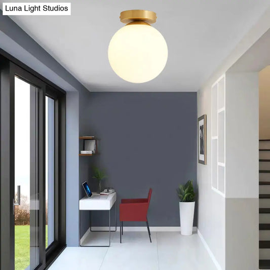 DecorBites™ DecorBites™ Sleek Minimalist Single Entryway Flush Mount Ceiling Light with Gold Accent & White Glass