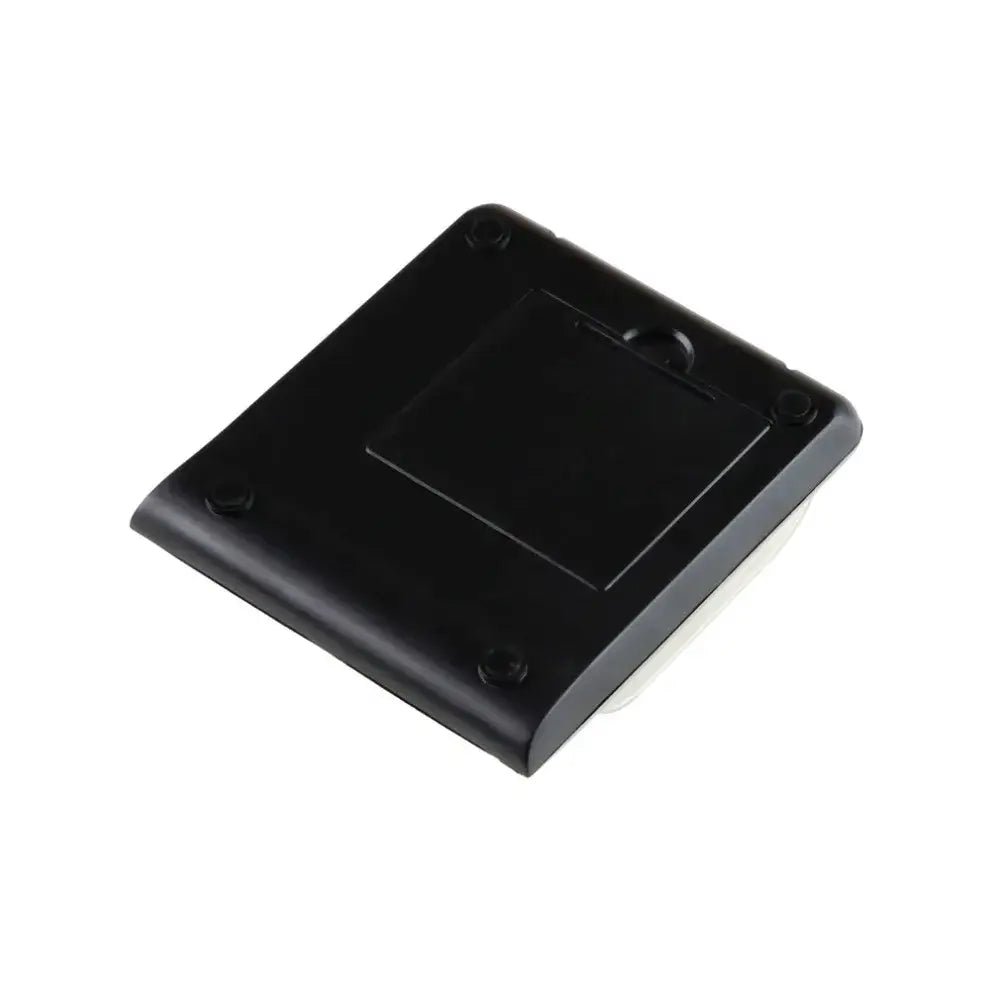 Black plastic solar-powered outdoor light with square design and screws shown alongside decorbites digital milligram scale