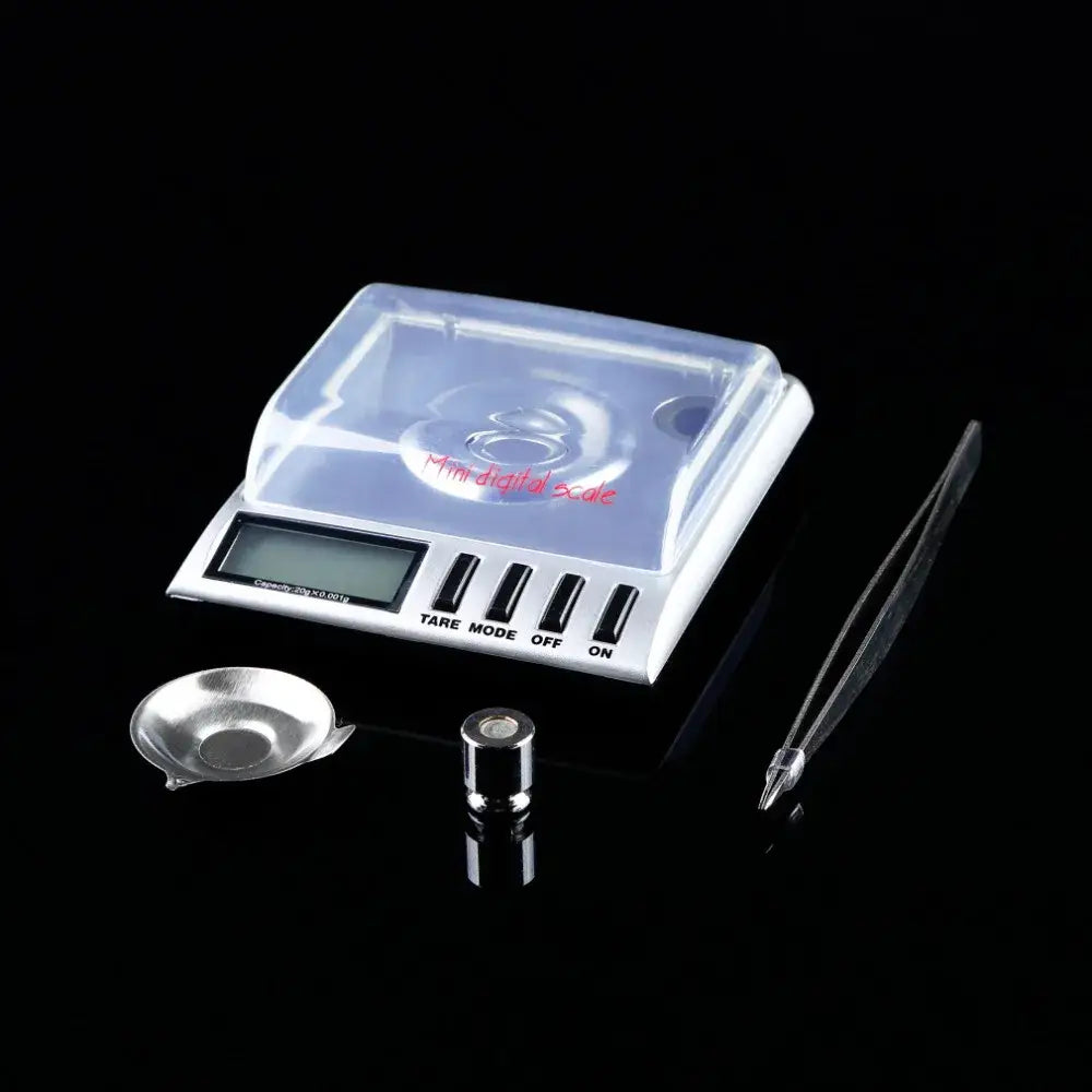 Sleek silver decorbites digital milligram gram scale with transparent cover tweezers dish and cylindrical weight for precision use