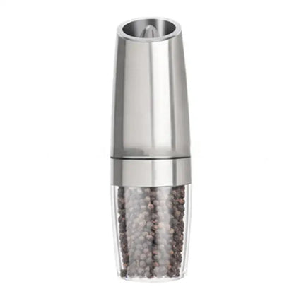Sleek silver stainless steel electric pepper and salt grinder set with clear acrylic base filled with peppercorns