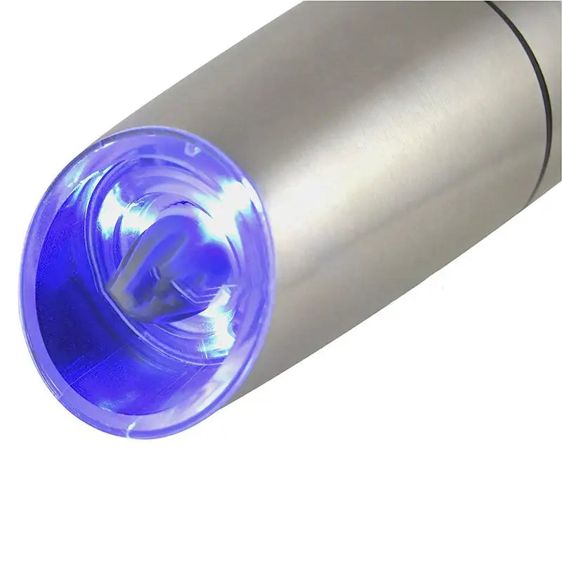 Sleek silver electric pepper and salt grinder set featuring a cylindrical led light with a translucent blue lens