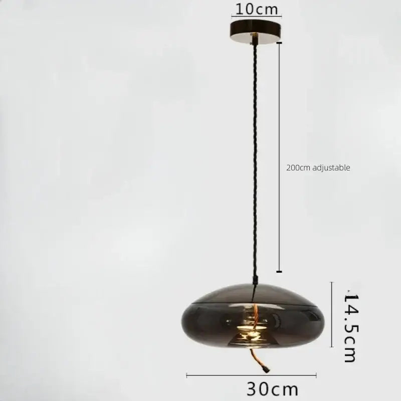 A sleek dark gray smoked glass led chandelier pendant light with a smooth dome shape and adjustable black cord