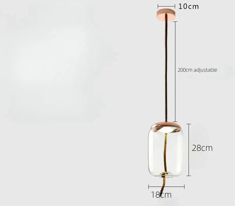 A sleek smoked glass led chandelier with a clear glass globe rose gold accents and adjustable black cord pendant light